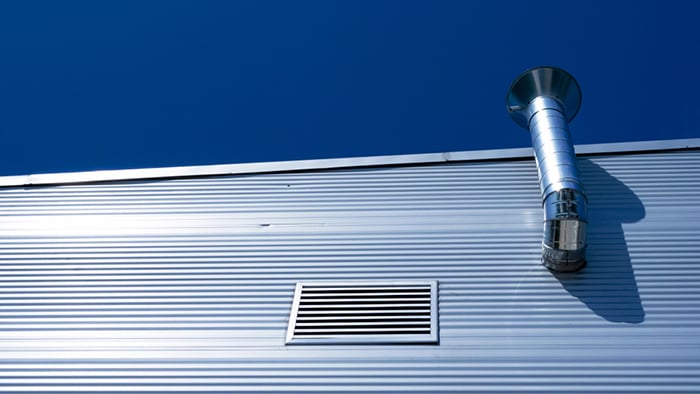 Cómo colocar un tubo de salida de gases a un calentador